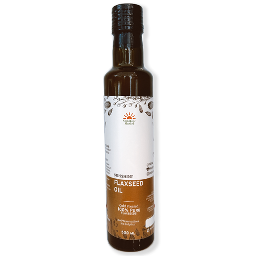 Bottle of Sunshine Market Flaxseed Oil, 250ml size, with a label indicating it is cold pressed and has health benefits.