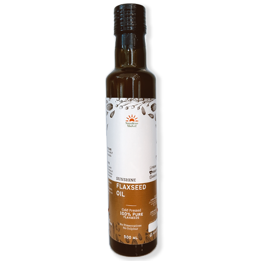 Bottle of Sunshine Market Flaxseed Oil, 250ml size, with a label indicating it is cold pressed and has health benefits.