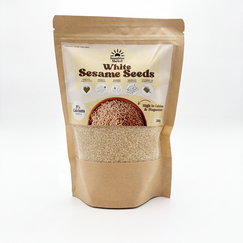 A 300g stand-up pouch of Spiesler Farm White Sesame Seeds on a clean white background. The kraft paper pouch features a clear window displaying the light beige sesame seeds inside, with a cream-colored label on the front displaying the brand logo and product details.