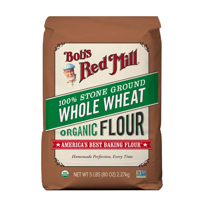 Bag of Bob's Red Mill 100% Stone Ground Whole Wheat Organic Flour on a white background