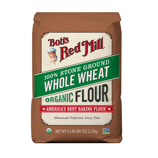 Bag of Bob's Red Mill 100% Stone Ground Whole Wheat Organic Flour on a white background