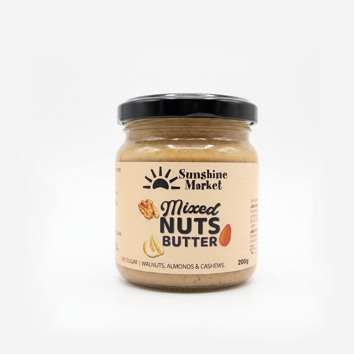 A jar of Sunshine Market Mixed Nuts Butter on a clean white background. The product is a light brown nut butter with a beige label and a black lid.