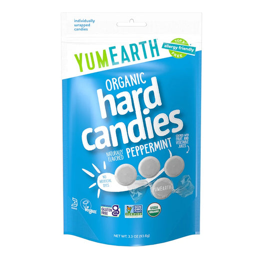 A package of Yum Earth Organic Peppermint Hard Candy displaying the candies and indicating the organic and vegan certifications.